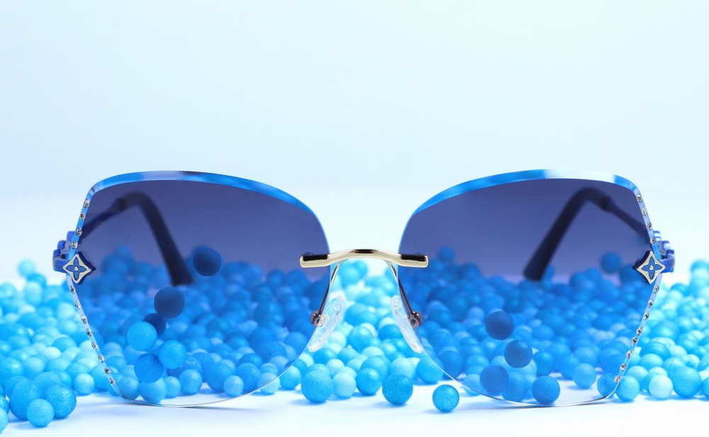 Damskie okulary przeciwsłoneczne glamour niebieskie z cyrkoniami